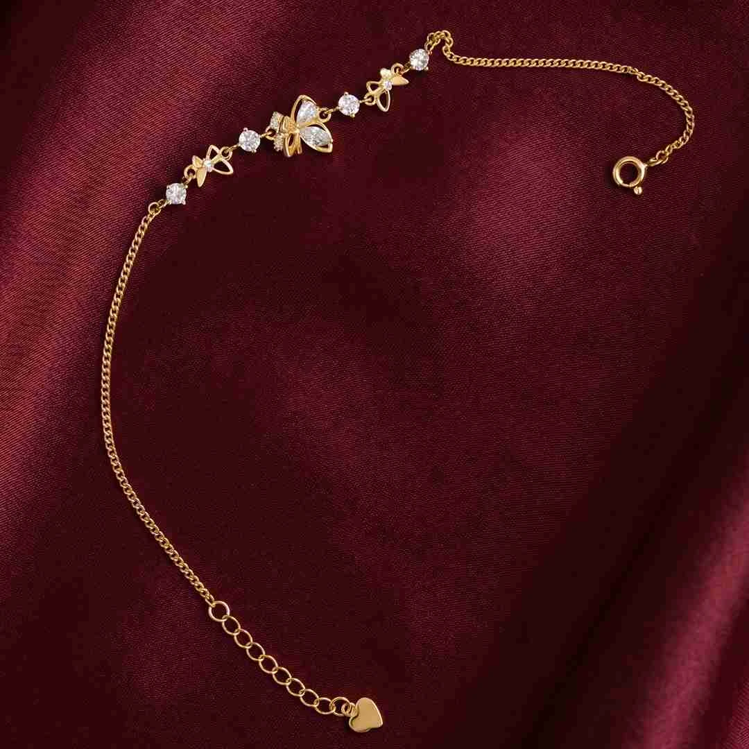 Golden Butterfly Serenade: Delicate Stone-Studded Bracelet